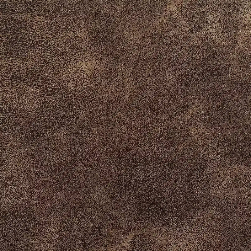 Sedia Elia marrone toffee con chiodini cromati: poliestere imbottito, borchie, struttura in legno